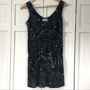 Black and white beach cover up with pockets. Size small. Smoke free home